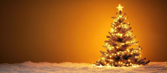 Poster - Festive Christmas tree adorned with glowing lights in a snowy landscape against a warm golden backdrop with space for holiday text.