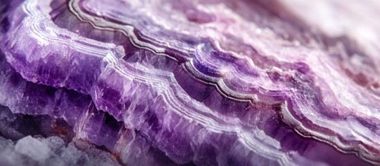 Poster - Textured purple Spanish fluorite crystal with layered patterns on a light gray background ideal for backgrounds or natural gemstone themes.