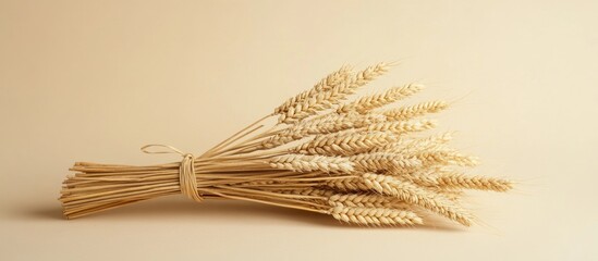 Poster - Dried wheat bouquet rustic decoration on neutral background for home or event styling and seasonal decor inspiration.