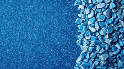 Poster - Blue gravel close up with smooth textured surface and blank space for text ideal for industrial or construction material concepts.