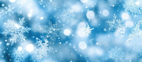 Poster - Winter blue background featuring cold water drops on glass and delicate snowflakes creating a serene and tranquil atmosphere.