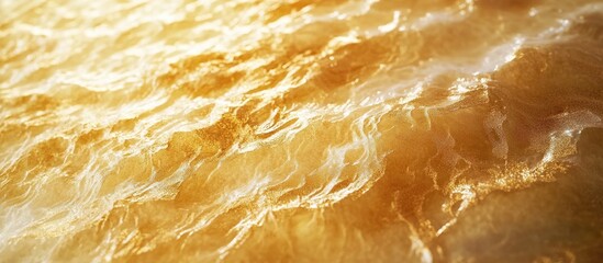Fototapete - Closeup of a golden textured plaster surface with soft wavy patterns ideal for backgrounds in creative design and art projects