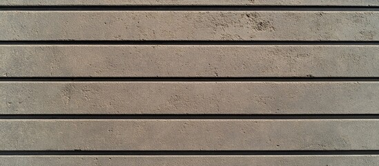 Leinwandbilder - Top view of a concrete surface featuring horizontal parallel lines with textured details for construction and design backgrounds.