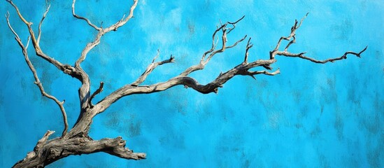 Poster - Dry tree branches against a vibrant blue sky creating a stunning contrast in nature's minimalism and aesthetic beauty.