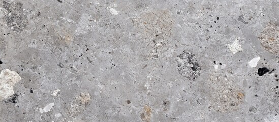 Fototapete - Gray concrete wall texture pattern for backgrounds or design purposes featuring various stone fragments and natural imperfections