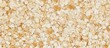© CryptoCanvas - Crushed wheat groats background texture in natural light showcasing a warm, earthy color palette ideal for culinary and organic themes.