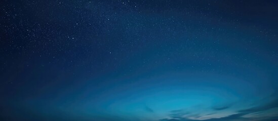 Poster - glowing white billboard illuminated against a deep blue night sky creating ideal copy space for adve