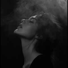 Wall Mural - Woman with head raised in smoke and fog creating a moody cinematic atmosphere in dark environment