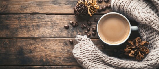 Poster - Cozy coffee scene with a cup, scarf, and pinecones on rustic wooden background, ideal for autumn or winter themed compositions.