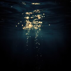 Wall Mural - Deep dark blue water with light reflections creating a mysterious underwater atmosphere