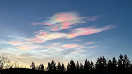 Iridescent clouds at twilight - Rare Polar Stratospheric Clouds at Twilight – Vibrant Pastel Sky Over Winter Landscape
