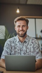 Poster - Smiling Young Male Freelancer Working On Laptop In Trendy Office Space, Business Startup Concept