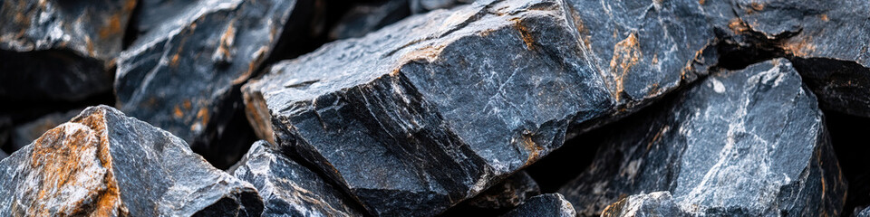 Wall Mural - Pile of Dark Gray and Black Rocks with Texture Detail