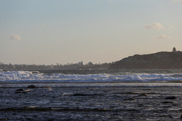 Wall Mural - view of beach shore on the summer afternoon.