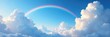 © tpadobestock - Clouds and rainbow stretching across a bright blue sky ,  colorful,  sky,  sunny