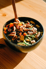 Wall Mural - salad served on a coconut bowl