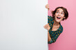 © deagreez - Portrait of overjoyed woman with bob hair wear print blouse hold white wall look at offer empty space isolated on pink color background
