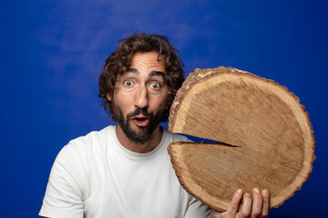 Sticker - young adult bearded man with a wooden copy space