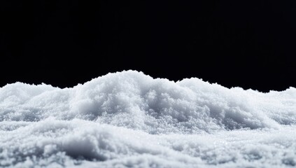 Poster - Snowdrift forming an undulating shape on black background