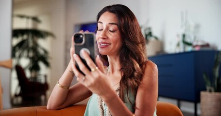 Poster - Happy woman, laughing and talking with video call or phone for communication, chat or virtual discussion on sofa at home. Female person, smile or mobile smartphone for online conversation at house