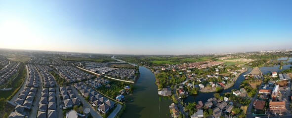 Poster - Aerial panorama of suburban neighborhood and river.