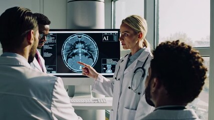 Aufkleber - Professional medical team analyzing a brain scan displayed on a digital monitor in a modern hospital or clinic, discussing findings and diagnosis in slow motion