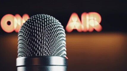 Poster - Professional microphone capturing high quality audio in slow motion, glowing on air sign illuminating dark background during sound recording session