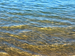 Wall Mural - serene ocean surface with gentle waves.