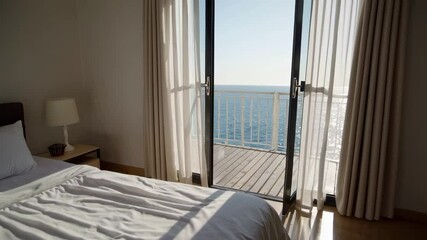 Aufkleber - Sunlight streams into a tranquil seaside hotel room as a gentle breeze gracefully opens the curtains, revealing a breathtaking ocean view in slow motion