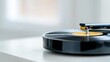 © BROPRADANA - Vinyl record player on white surface, bright background, music enjoyment