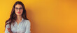 © pier - confident businesswoman glasses white shirt orange background copy space web banner professional