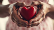 © Silva - Hands holding a red heart symbolizing care and love, ideal for blogs, social campaigns, and medical awareness