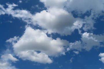 Wall Mural - Beautiful cloudscape in blue sky, natural clouds background 