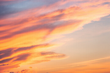 Wall Mural - changing weather forecast. global warming. red clouds on the bue evening sky. dramatic sunset backgr