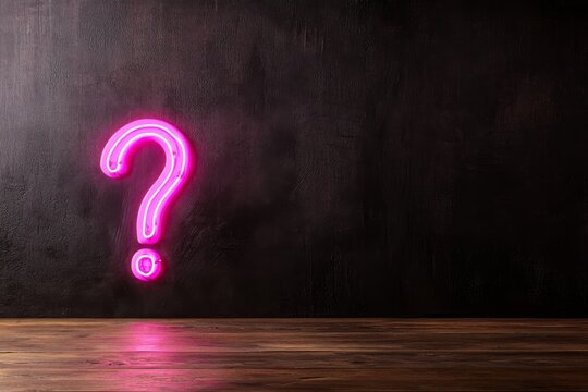 Bright pink neon question mark illuminates a dark background, creating a striking visual. Generous empty space on the right allows for additional text or elements