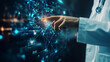 © mahamad - A doctor's hand points to a digital data structure, illustrating the concept of virtual medicine.