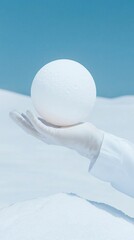 Poster - Creative white sphere sculpture held by hand minimalist background artistic presentation tranquil environment