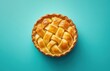 © ANUAR - Delicious homemade apple pie with golden flaky crust on vibrant turquoise background, perfect for culinary and dessert-themed projects