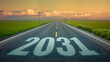 © nicholashan - New Year 2031 road leading to the future and new hope concept - AI generated