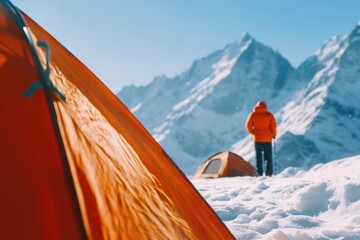 Poster - A person stands beside a tent in snowy surroundings