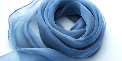 Poster - A close-up shot of a blue scarf lying on a white background