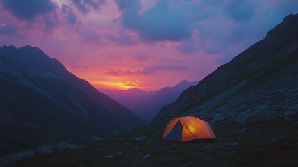 Poster - A vibrant sunset over mountains with a glowing orange tent, inviting outdoor adventure.