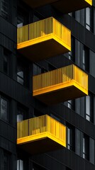 Aufkleber - Bold yellow balconies punctuate a sleek black facade, embodying a minimalist approach to urban architecture. This striking modern design highlights unique geometry and color dynamics