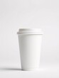 © Studio VIP - A high-quality paper coffee cup mockup is perfectly centered on a clean white background, ideal for branding and product presentations.