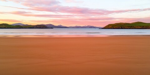 Poster - A serene beach at sunset, showcasing gentle waves and colorful skies with mountains in the distance, creating a tranquil atmosphere.