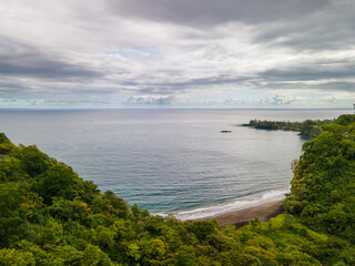 Wall Mural - Panorama view to the Hawaiian Island of Maui with cloudy shape and sunset light impressions