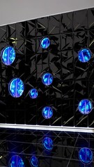 Fototapete -  Circular cutouts set into a dark tiled background with large blue leaves, minimal and neon accents for a modern art style