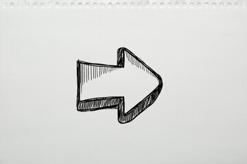 Wall Mural - one black arrow on notebook paper. pointer