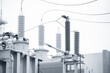 © Parilov - Electrical substation with high voltage switches, wires, transformer, ceramic insulators