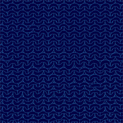 Poster - A blue patterned fabric with a blue design is made up of circles and triangles